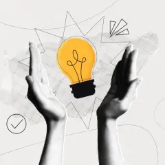 Twee handen omarmen een gloeiende gloeilamp, symbool voor een idee. Dit beeld kan de complexiteit van hoe ontstaat ADHD illustreren, met verschillende factoren die samenkomen.