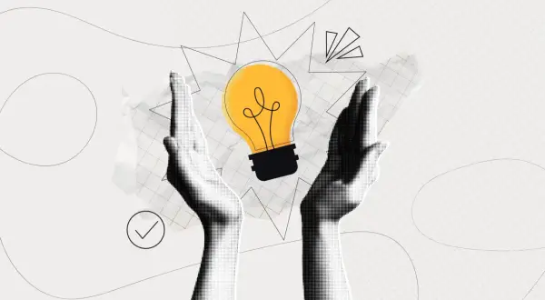 Twee handen omarmen een gloeiende gloeilamp, symbool voor een idee. Dit beeld kan de complexiteit van hoe ontstaat ADHD illustreren, met verschillende factoren die samenkomen.